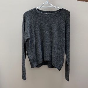 Grey fuzzy sweater from H&M.